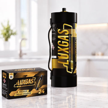 LUXGAS cream charger and 2100g N₂O cylinder in a professional kitchen