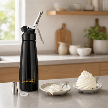 Professional whipped cream dispenser beside runny and properly aerated cream during troubleshooting in a commercial kitchen.